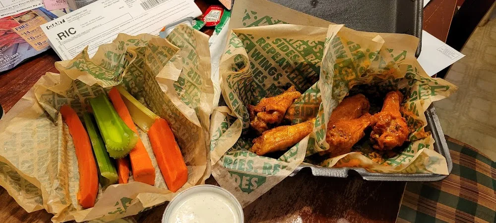 Wingstop food and storefront view at 98 South 32nd St in Camp Hill, Pennsylvania