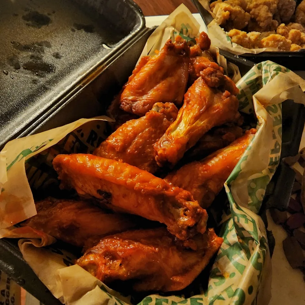 Wingstop food and storefront view at 2118 Cottman Ave in Philadelphia, Pennsylvania
