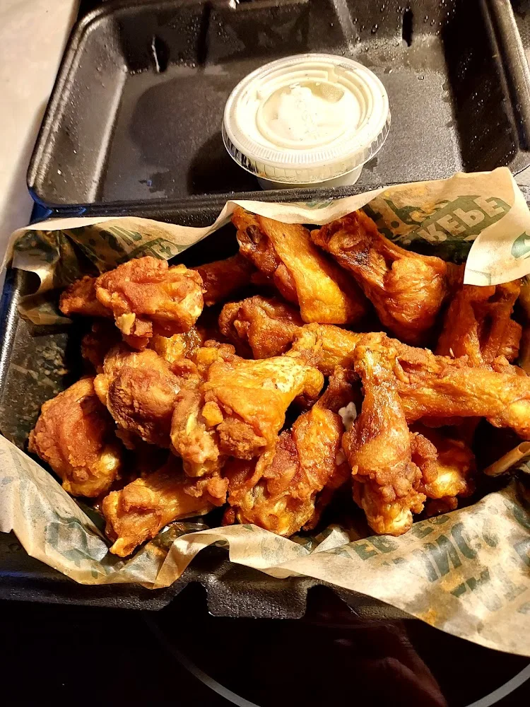Wingstop food and storefront view at 10 Old Clairton Road in Pittsburgh, Pennsylvania
