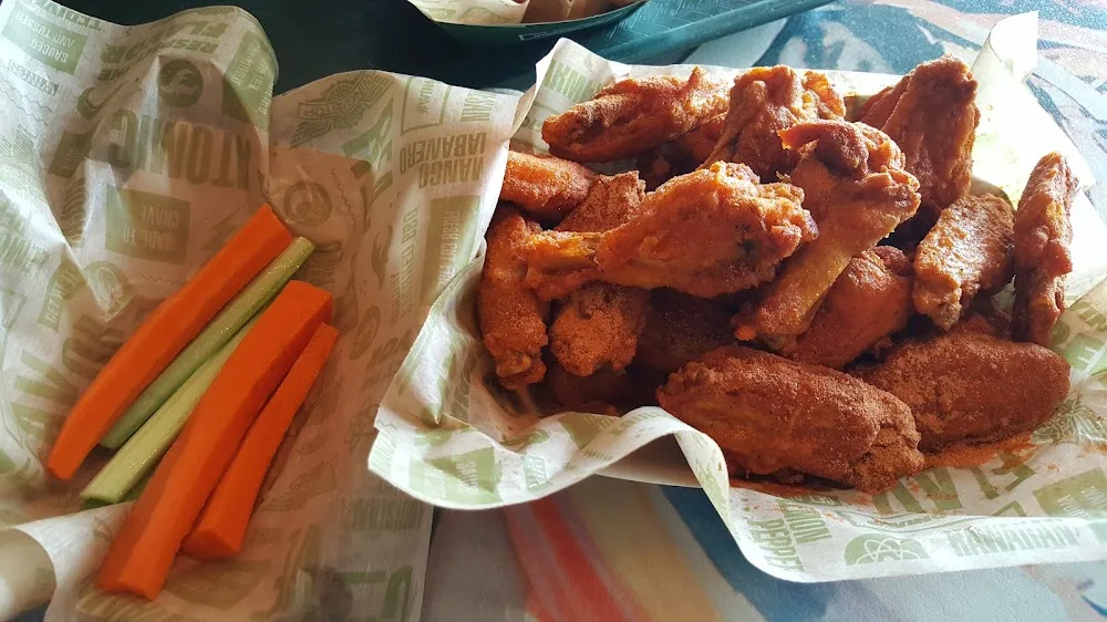 Wingstop food and storefront view at 1605 N Germantown Pkwy Ste 103 in Cordova, Tennessee