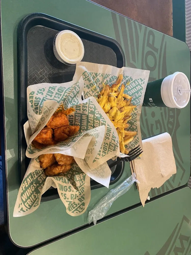 Wingstop food and storefront view at 235 East Main St in Hendersonville, Tennessee
