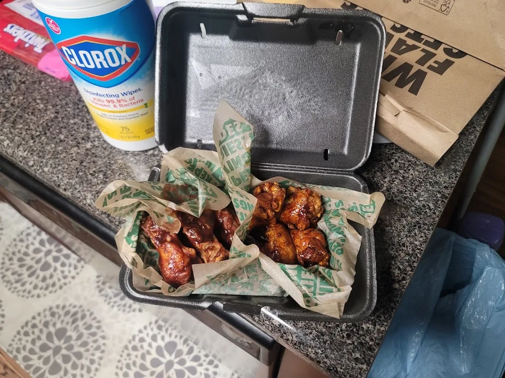 Wingstop food and storefront view at 2706 Old Fort Parkway Suite A in Murfreesboro, Tennessee