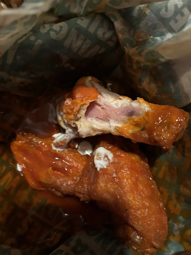 Wingstop food and storefront view at 2048 Rosa L. Parks Blvd. in Nashville, Tennessee