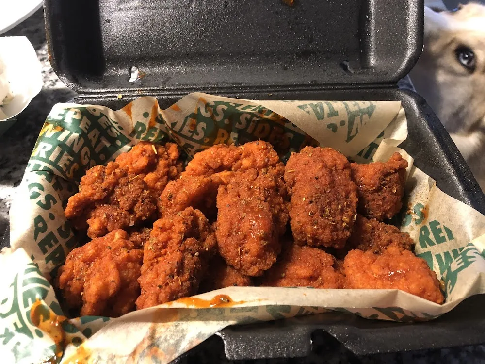 Wingstop food and storefront view at 479 Highway 76 in White House, Tennessee