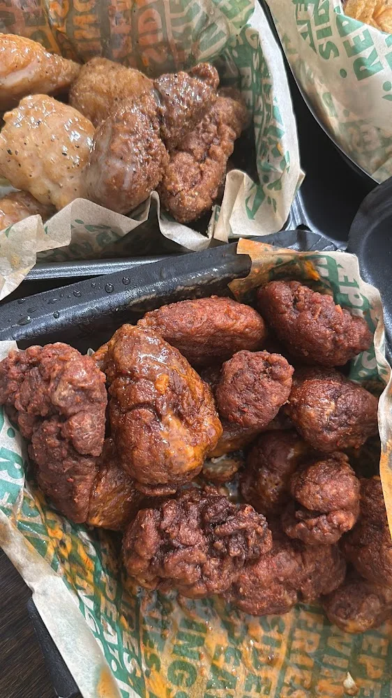 Wingstop food and storefront view at 1451 Duranta Ave Ste 6 in Alamo, Texas