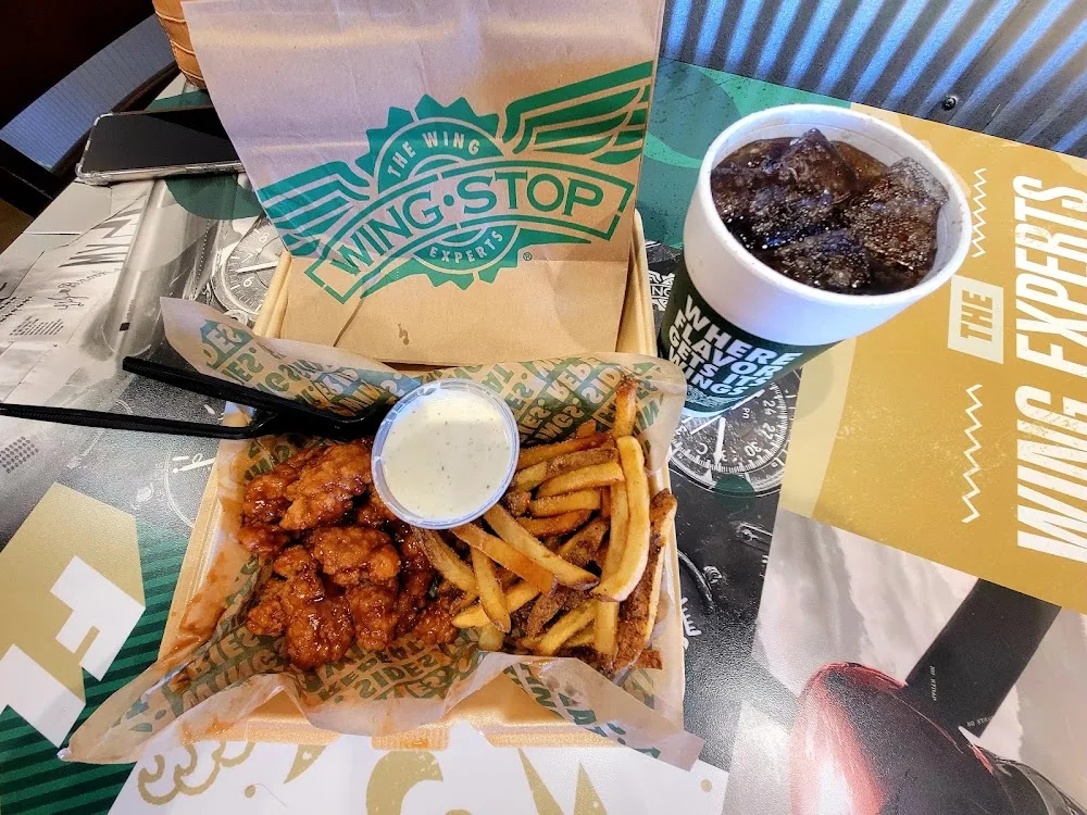 Wingstop food and storefront view at 5512 Gem Lake Rd STE 700 in Amarillo, Texas