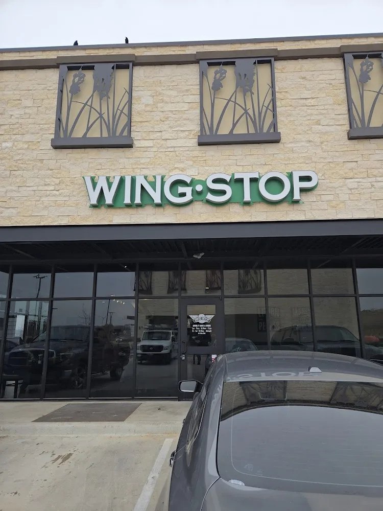 Wingstop food and storefront view at 4010 N Collins St in Arlington, Texas