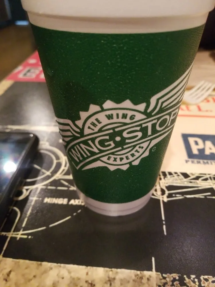 Wingstop food and storefront view at 2030 S Cooper in Arlington, Texas