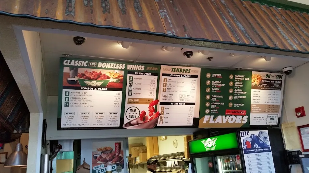 Wingstop food and storefront view at 2356 SE Green Oaks Blvd Ste 190 in Arlington, Texas