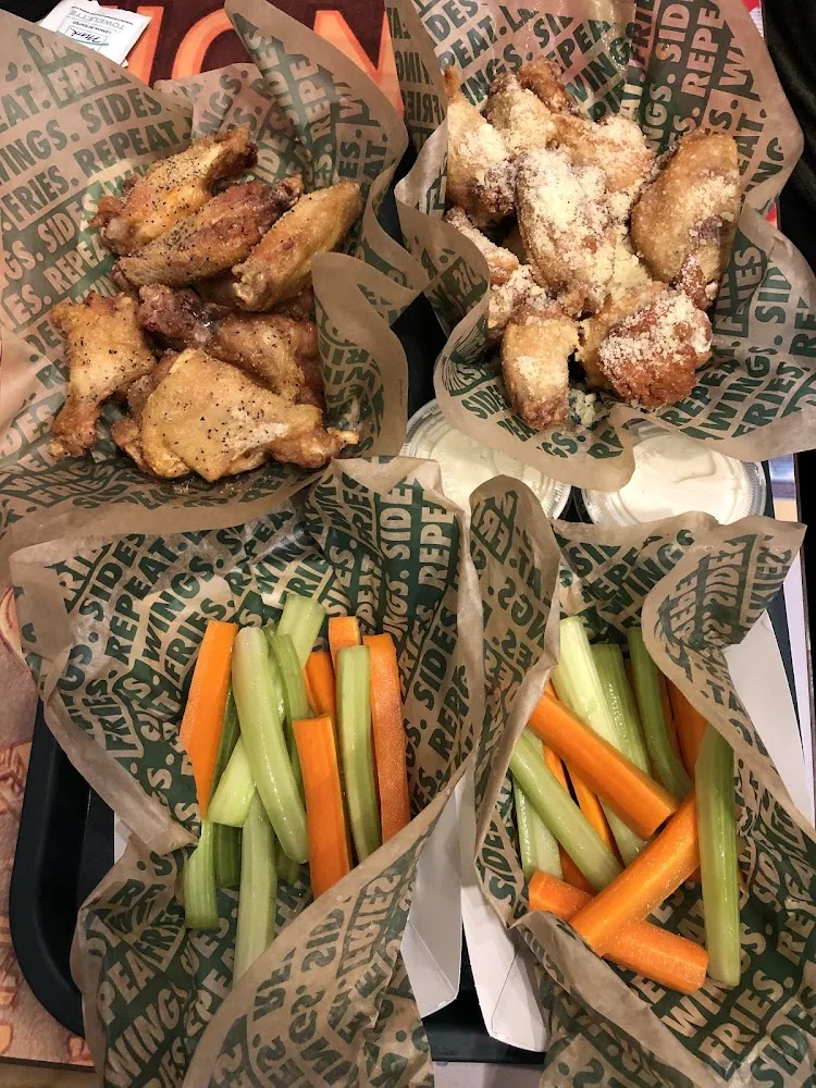 Wingstop food and storefront view at 500 W William Cannon Dr Ste 422 in Austin, Texas
