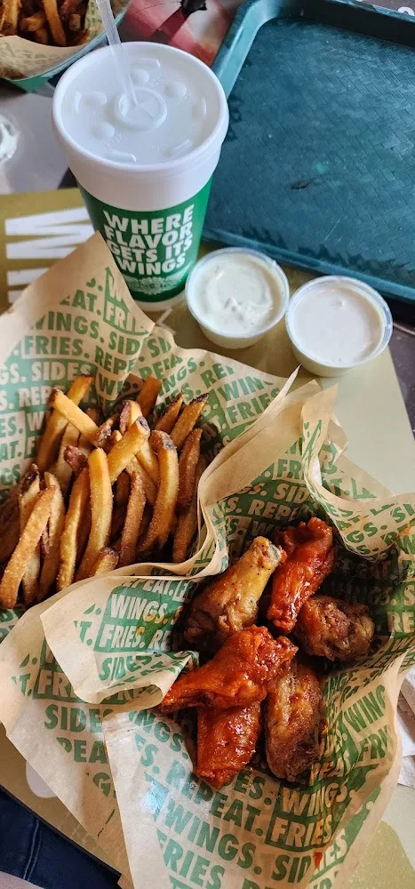 Wingstop food and storefront view at 7826 W. US Highway 290 Suite 104 in Austin, Texas