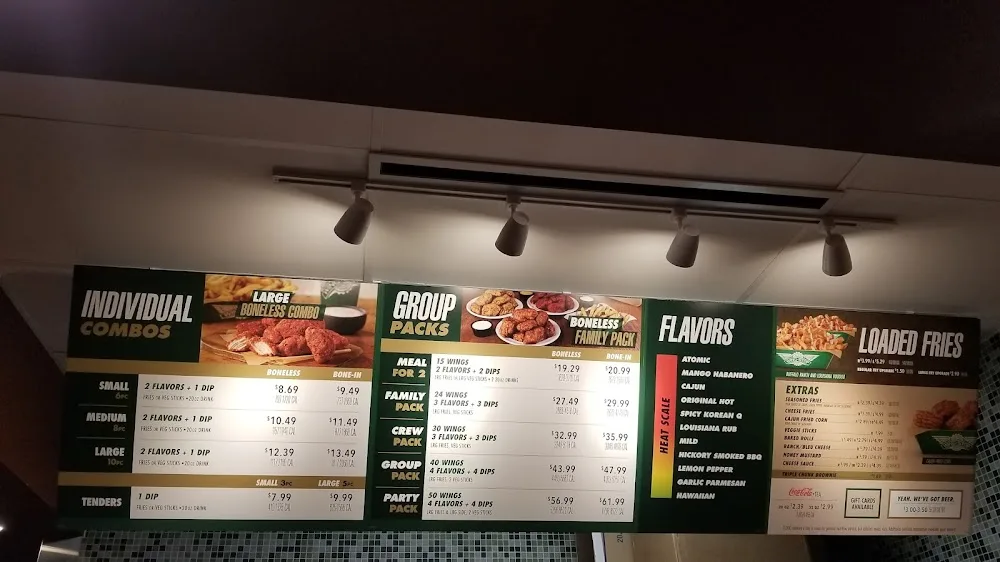 Wingstop food and storefront view at 2642 Tx-36 in Brenham, Texas
