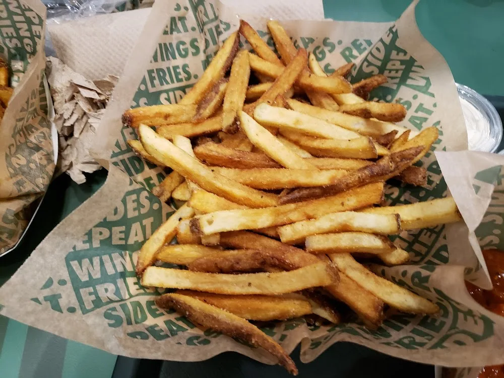 Wingstop food and storefront view at 2503 S. Gregg Street Suite D in Big Spring, Texas