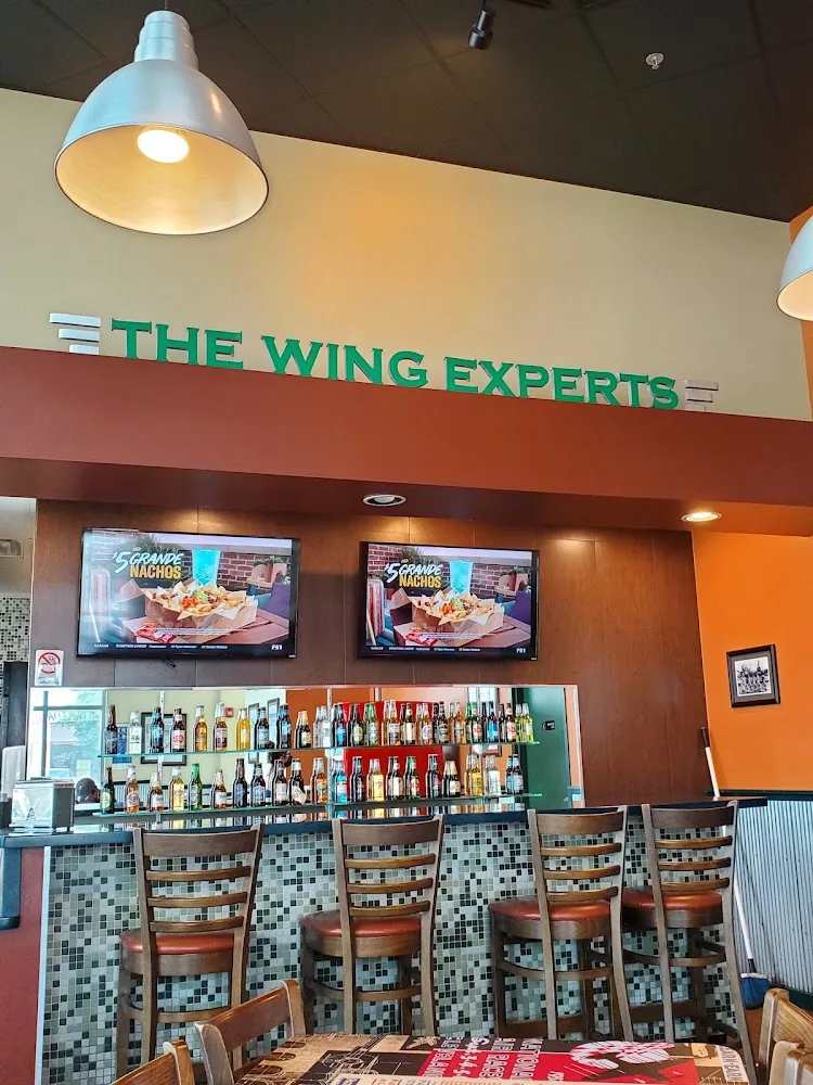 Wingstop food and storefront view at 755 International Blvd Ste G in Brownsville, Texas