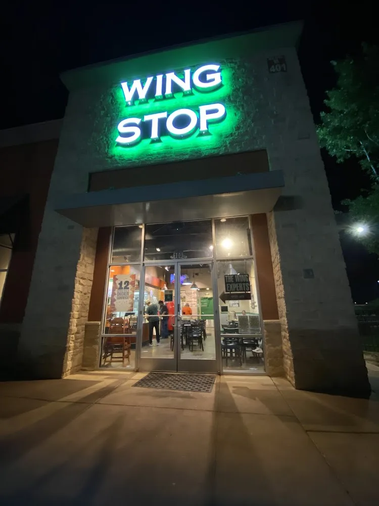 Wingstop food and storefront view at 401 W Whitestone Blvd Ste B100 in Cedar Park, Texas