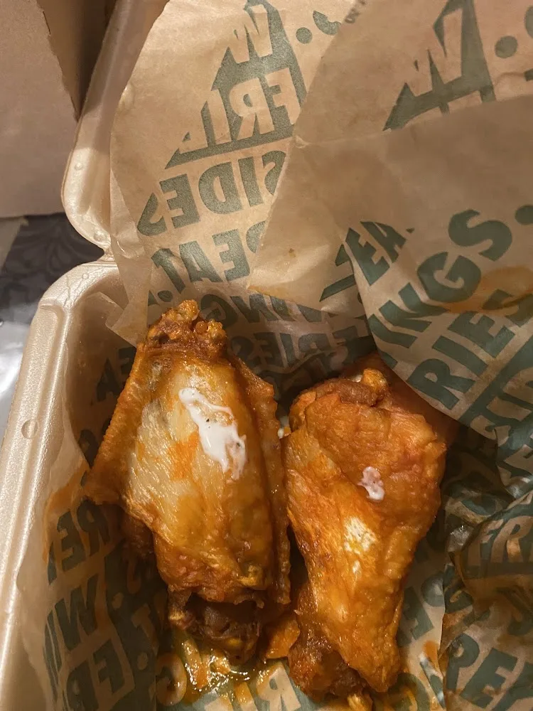 Wingstop food and storefront view at 431 Sheldon Rd in Channelview, Texas
