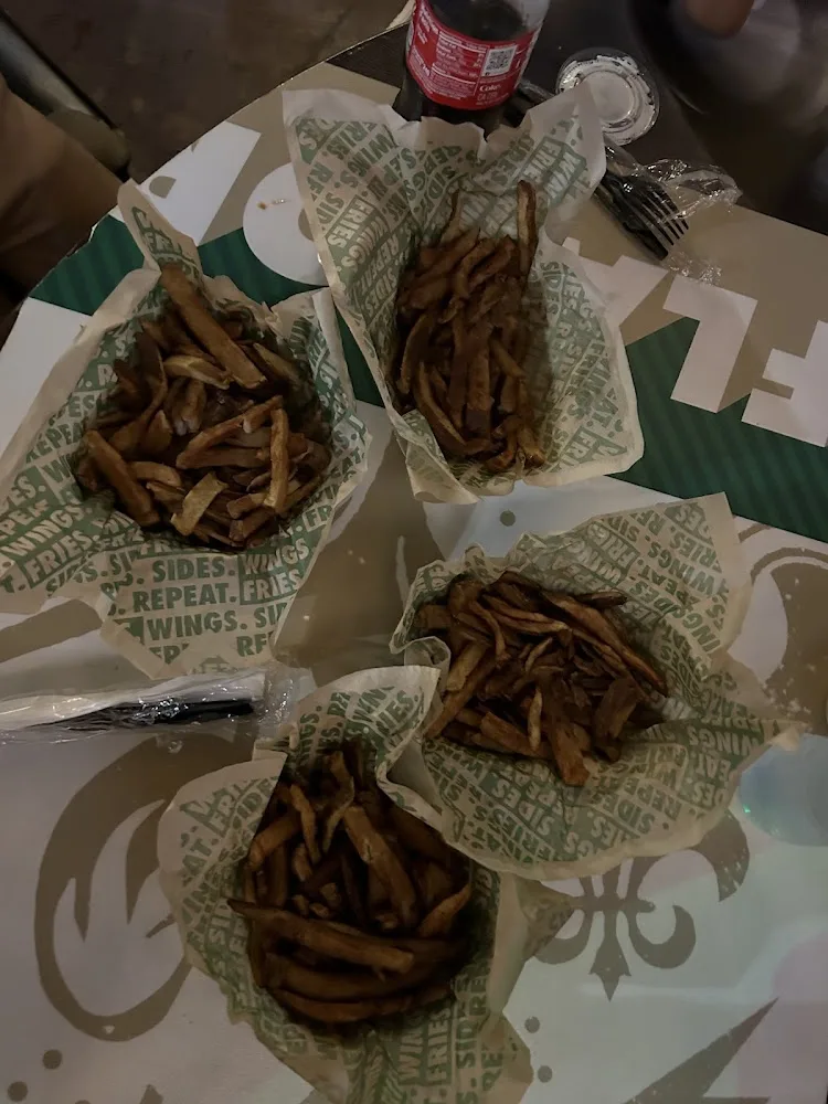 Wingstop food and storefront view at 6313 Wooldridge Rd Ste 1 in Corpus Christi, Texas