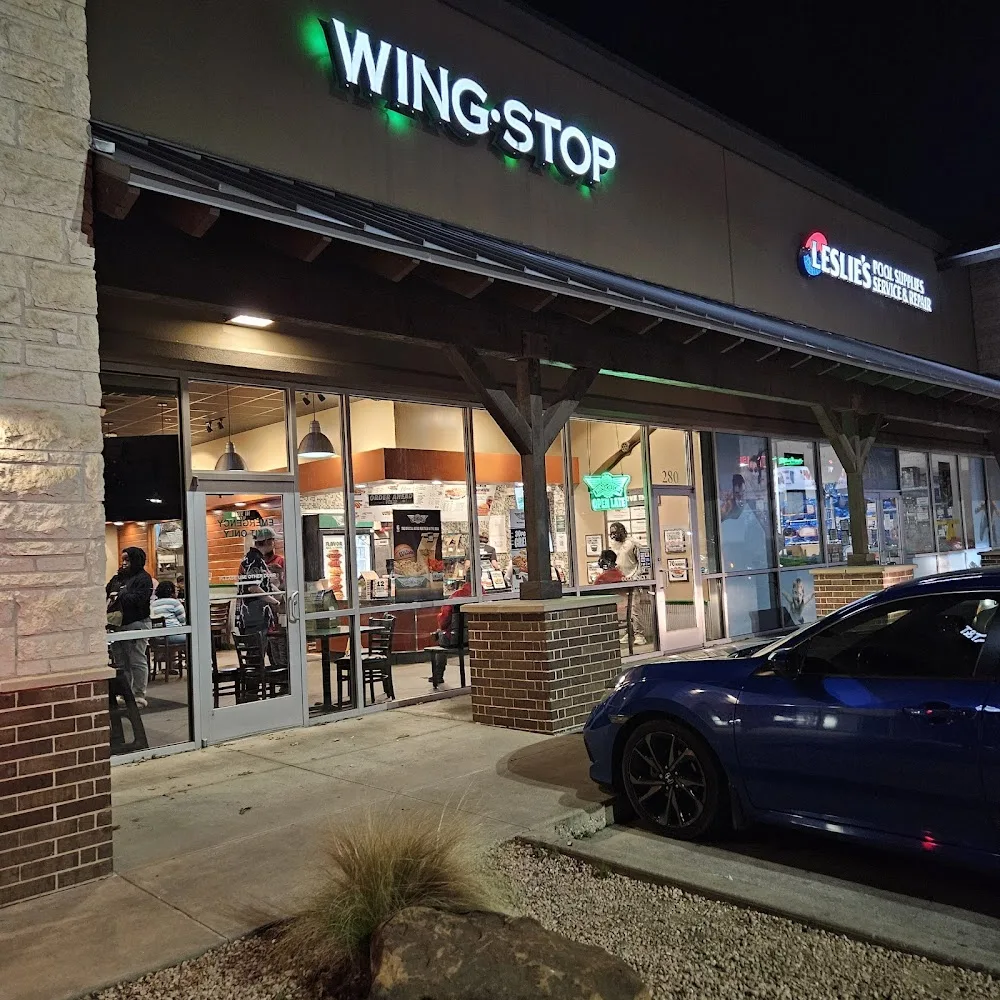 Wingstop food and storefront view at 11750 US-380 #280 in Cross Roads, Texas