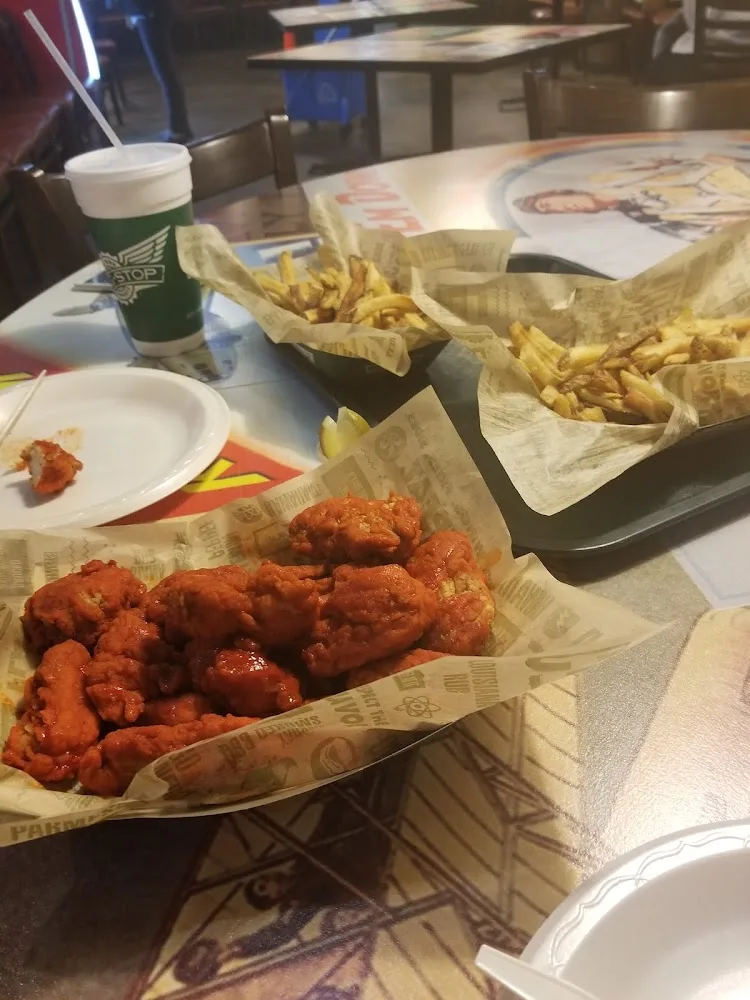 Wingstop food and storefront view at 1500 W 7Th Ave in Corsicana, Texas