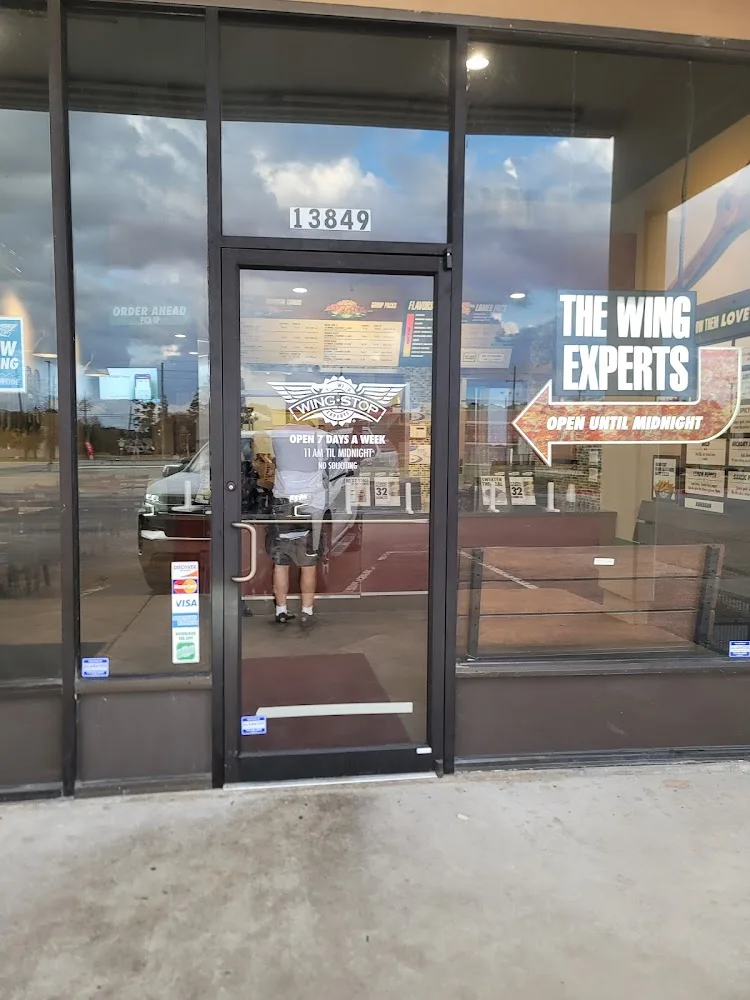 Wingstop food and storefront view at 13849 Cypress North Houston Rd in Cypress, Texas