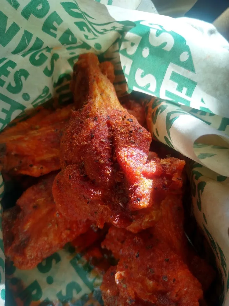 Wingstop food and storefront view at 28404 US-290 G17 in Cypress, Texas