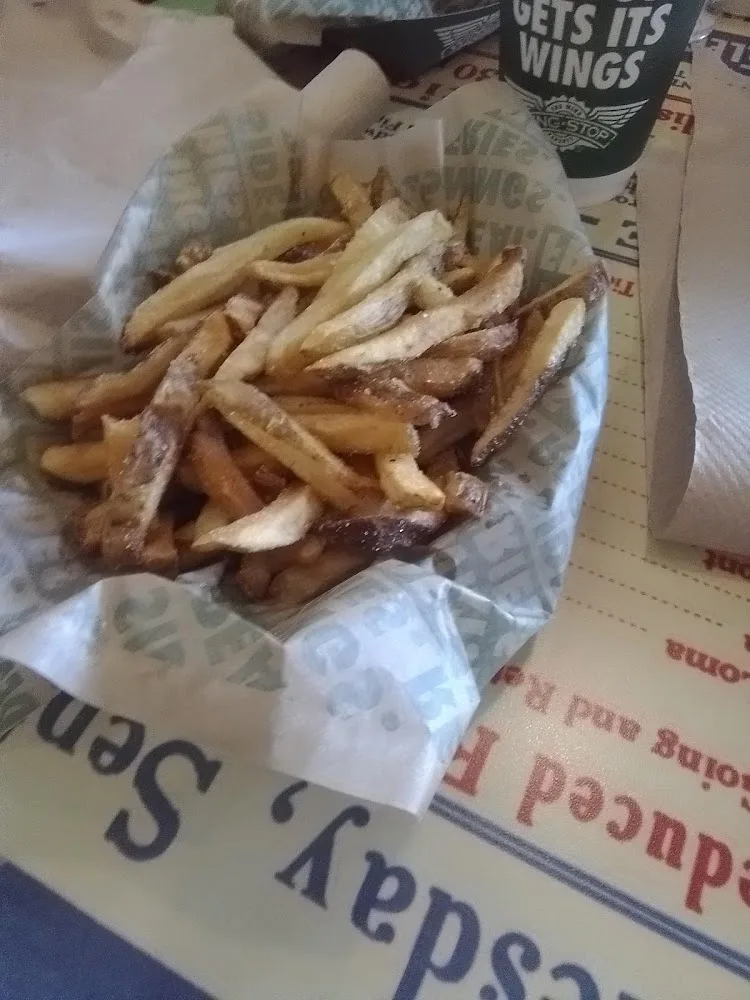 Wingstop food and storefront view at 14119 Grant Road in Cypress, Texas