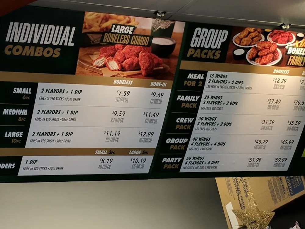 Wingstop food and storefront view at 6130 Greenville Ave Ste 108 in Dallas, Texas