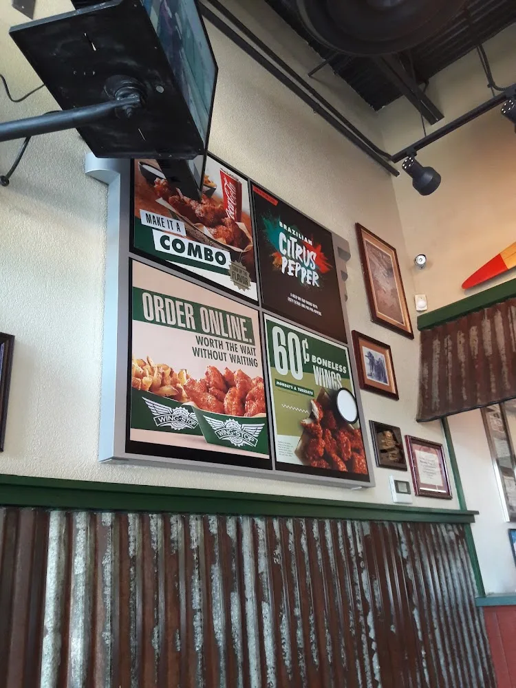 Wingstop food and storefront view at 2627 W Jefferson Blvd Ste 214 in Dallas, Texas