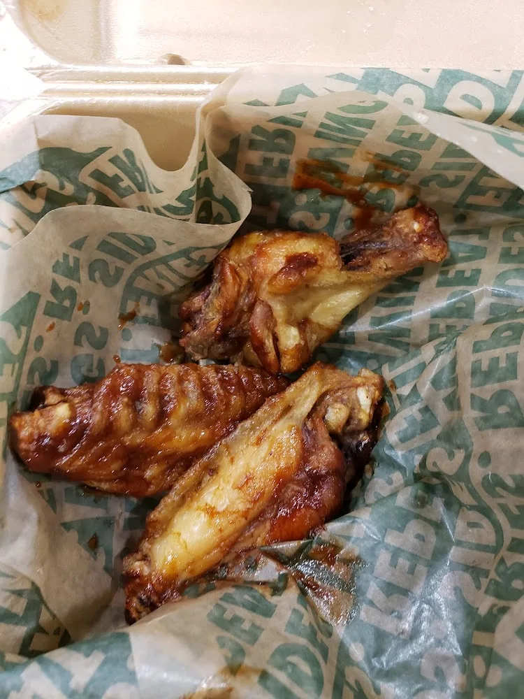 Wingstop food and storefront view at 10325 Lake June Rd Ste 570 in Dallas, Texas