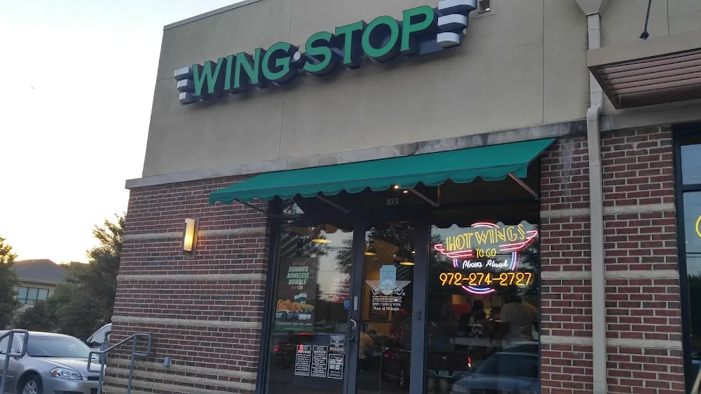 Wingstop food and storefront view at 209 East Pleasant Run Rd in Desoto, Texas