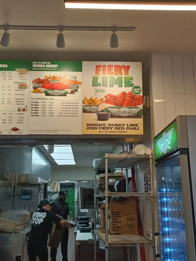 Wingstop food and storefront view at 209 East Pleasant Run Rd in Desoto, Texas