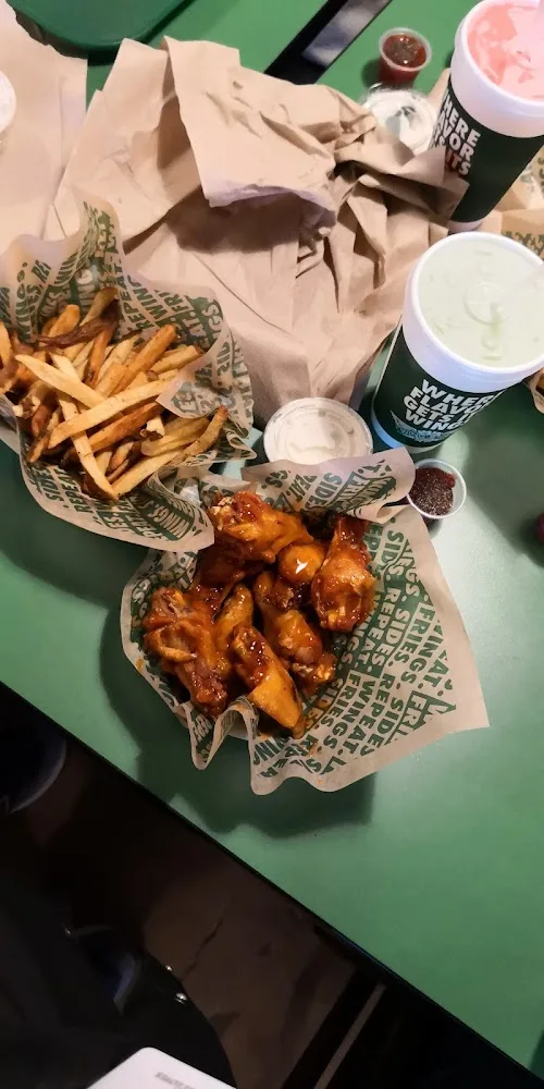 Wingstop food and storefront view at 1814 E. IH-2 STE A in Donna, Texas