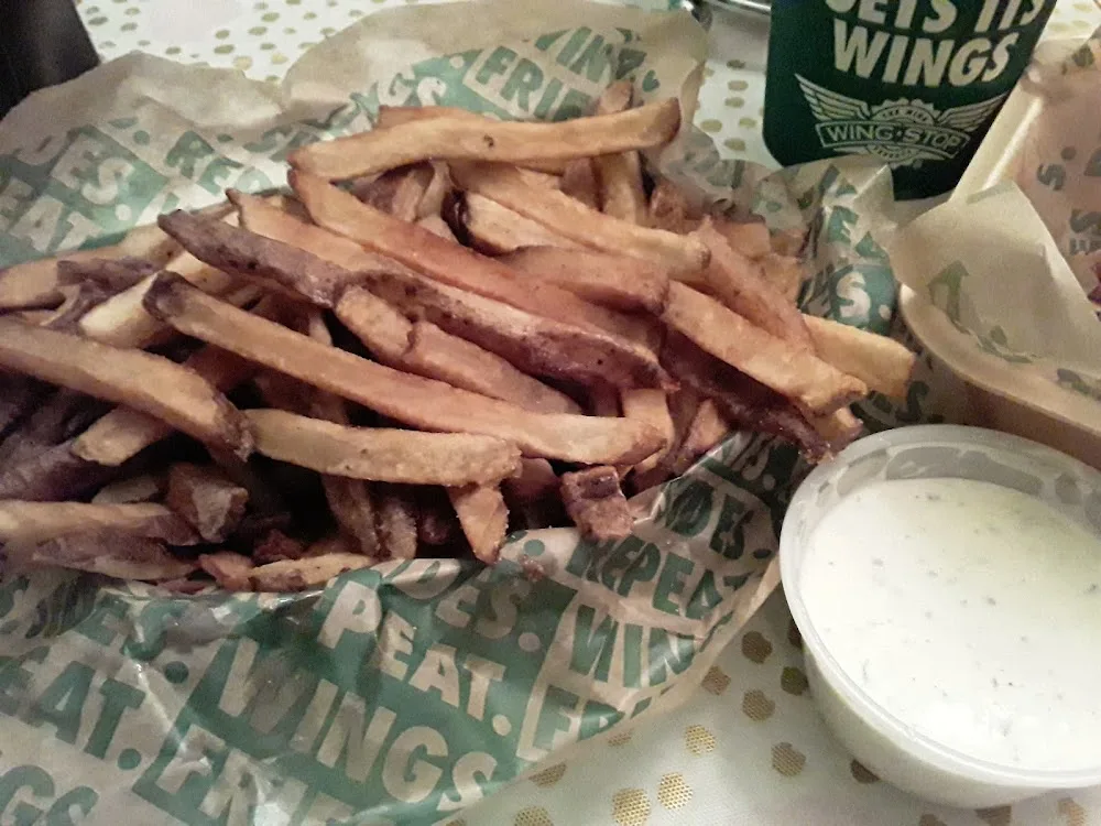 Wingstop food and storefront view at 1814 E. IH-2 STE A in Donna, Texas