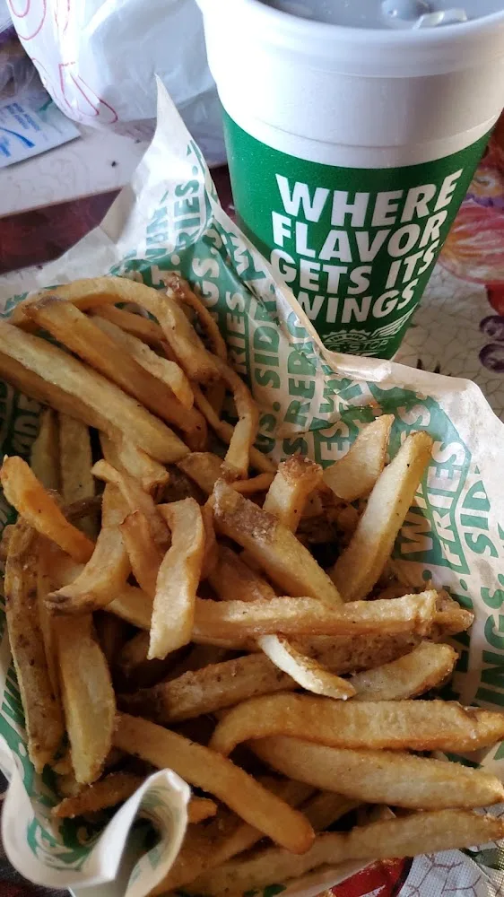 Wingstop food and storefront view at 8825 North Loop Dr in El Paso, Texas