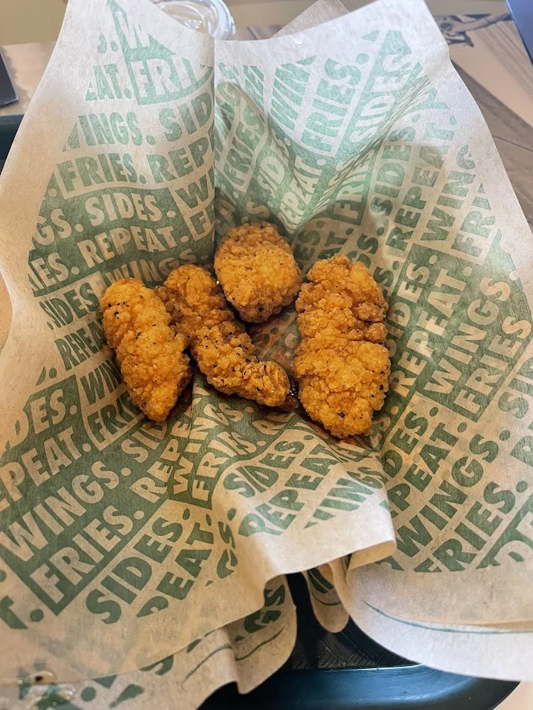 Wingstop food and storefront view at 3001 State Hwy 121 in Euless, Texas