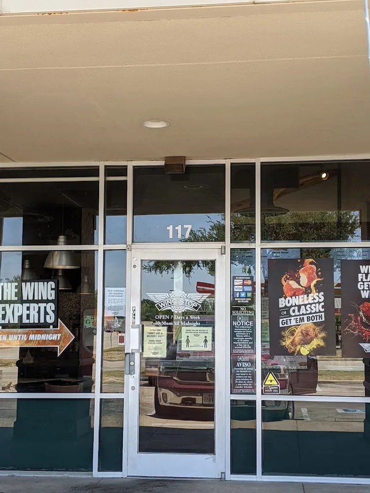 Wingstop food and storefront view at 1801 Eastchase Pkwy Ste 117 in Fort Worth, Texas