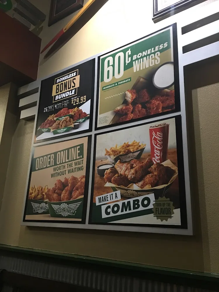 Wingstop food and storefront view at 301 Clifford Center Dr Ste 101 in Fort Worth, Texas