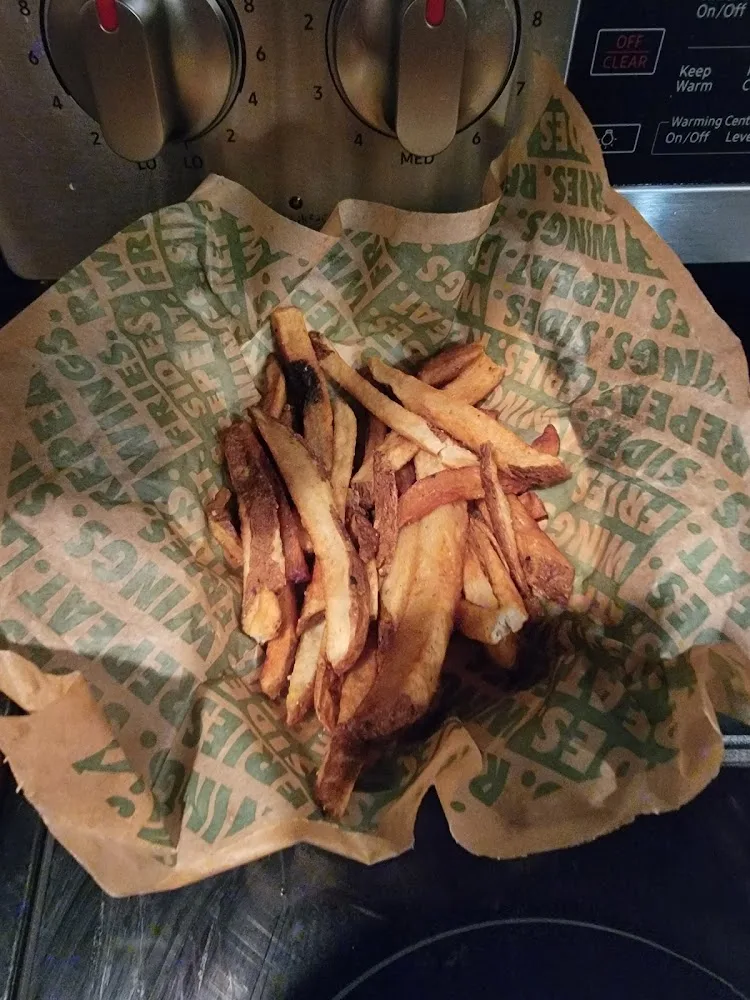 Wingstop food and storefront view at 9616 Red Dirt in Fort Worth, Texas