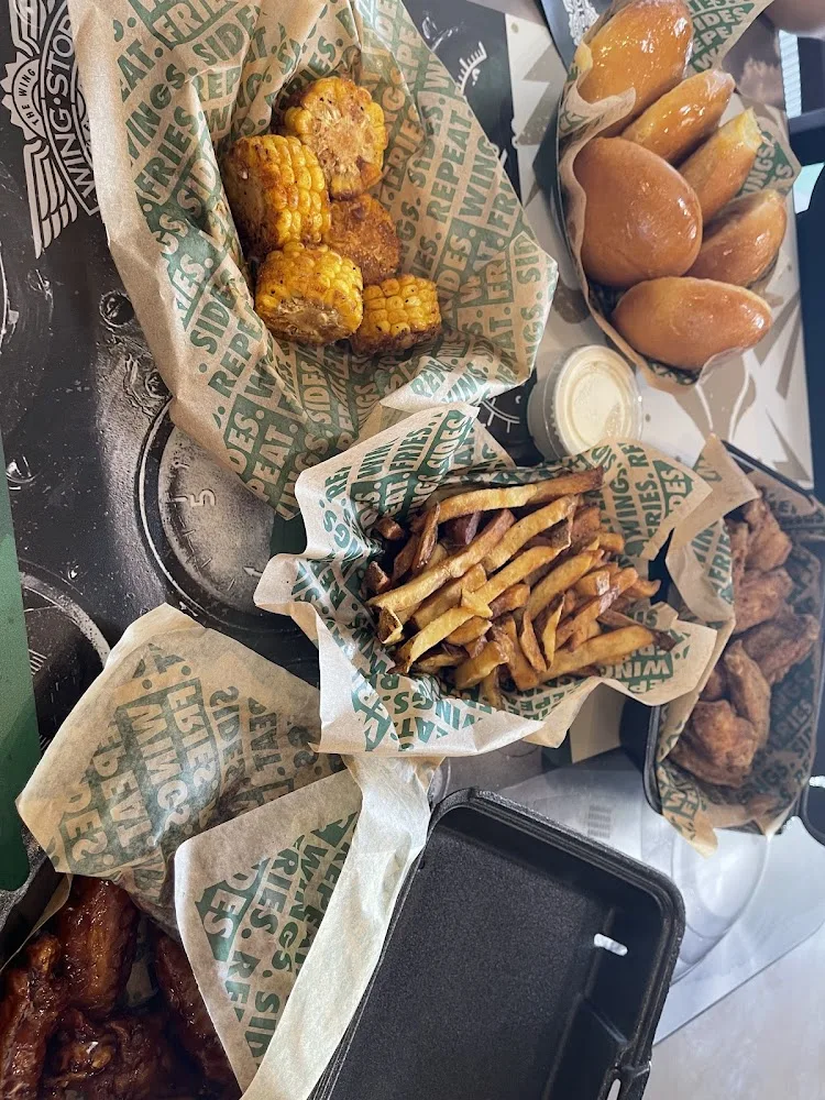 Wingstop food and storefront view at 905 E Hwy 82 in Gainesville, Texas
