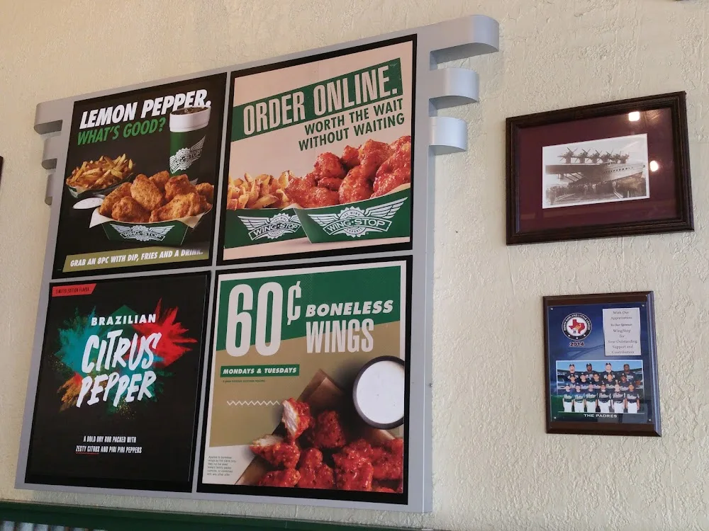 Wingstop food and storefront view at 2334 W Buckingham Rd Ste 330 in Garland, Texas