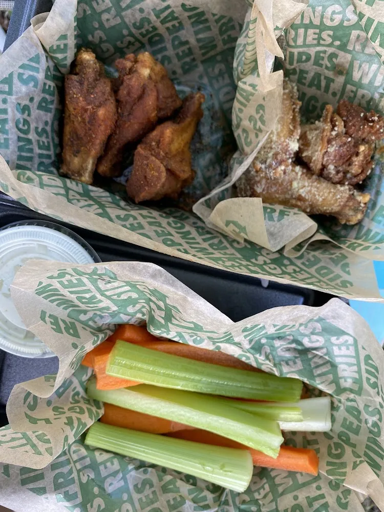 Wingstop food and storefront view at 4750 N. Jupiter Rd. Ste. 112 in Garland, Texas