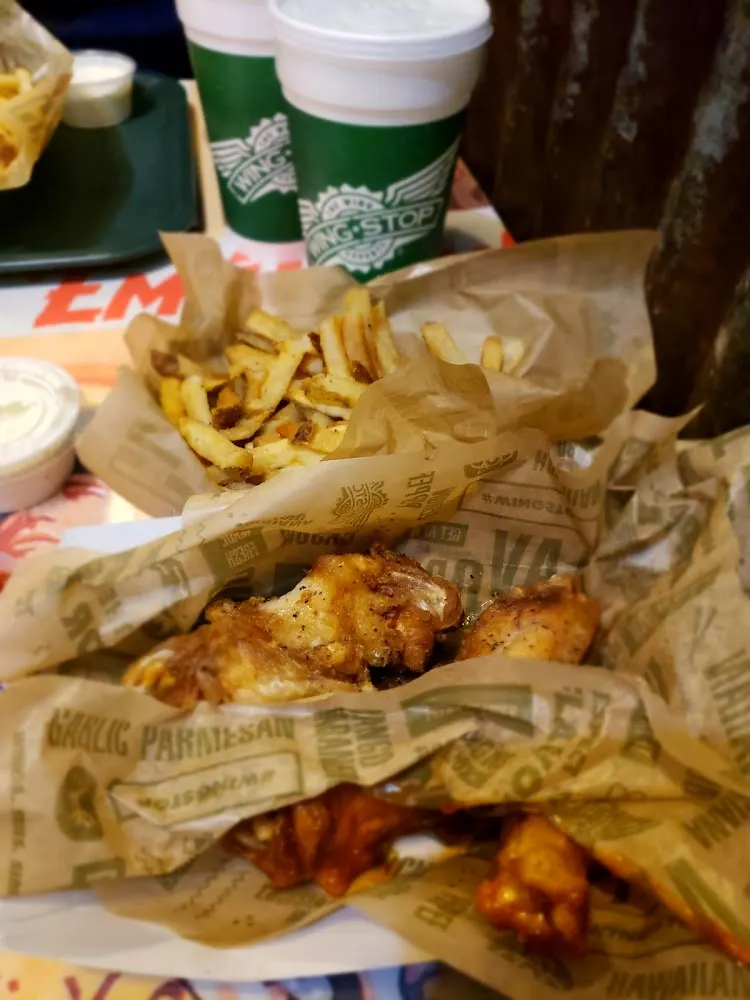 Wingstop food and storefront view at 1215 Arkansas Lane in Grand Prairie, Texas