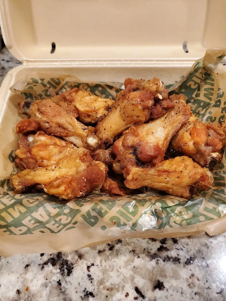 Wingstop food and storefront view at 300 E FM 2410 Rd in Harker Heights, Texas