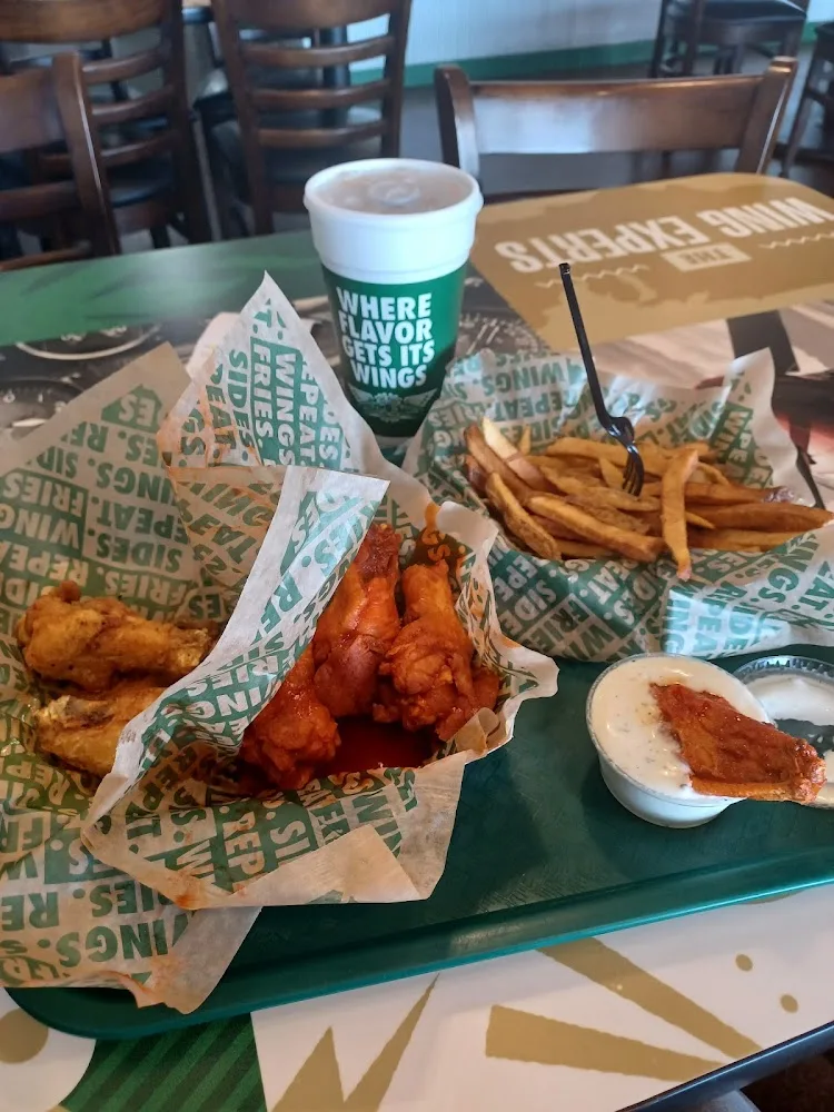 Wingstop food and storefront view at 13855 Horizon Blvd in Horizon City, Texas