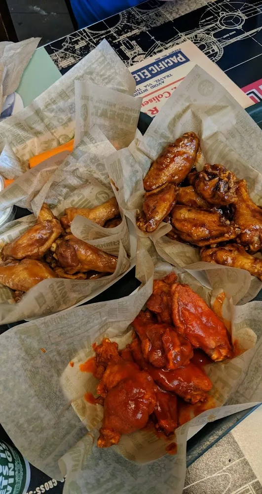 Wingstop food and storefront view at 2230 Fm 407 Ste 290 in Highland Village, Texas