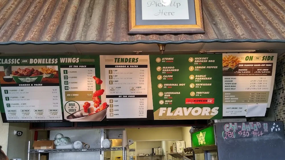 Wingstop food and storefront view at 11926 Wilcrest Dr in Houston, Texas