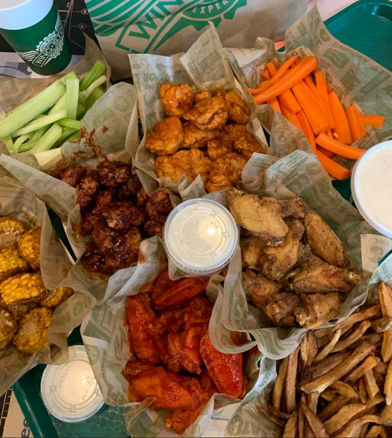 Wingstop food and storefront view at 2403 Bay Area Blvd in Houston, Texas