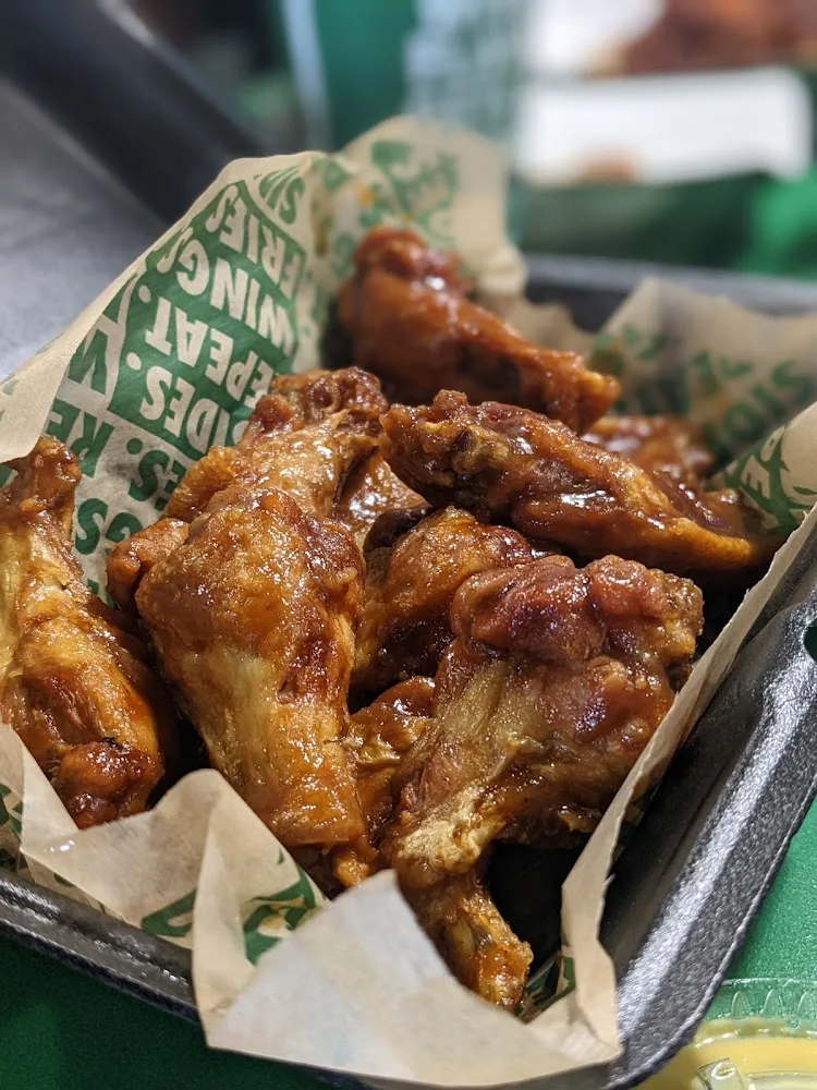 Wingstop food and storefront view at 19754 Tomball Pkwy Ste 4 in Houston, Texas