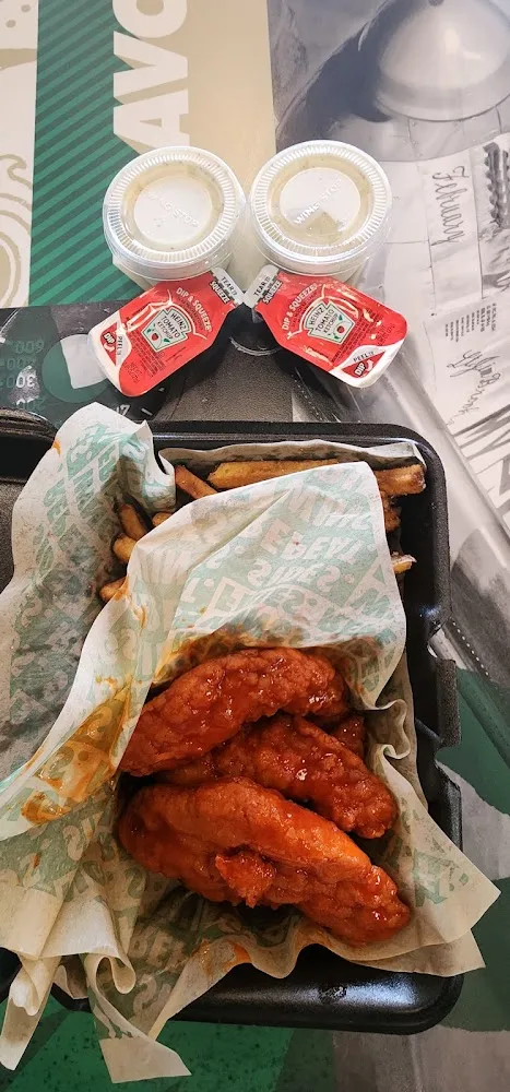 Wingstop food and storefront view at 1049 Blalock Rd in Houston, Texas