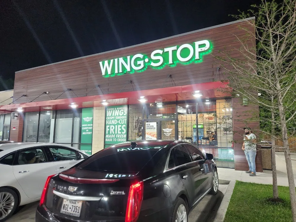Wingstop food and storefront view at 7610 N. Wayside Drive in Houston, Texas
